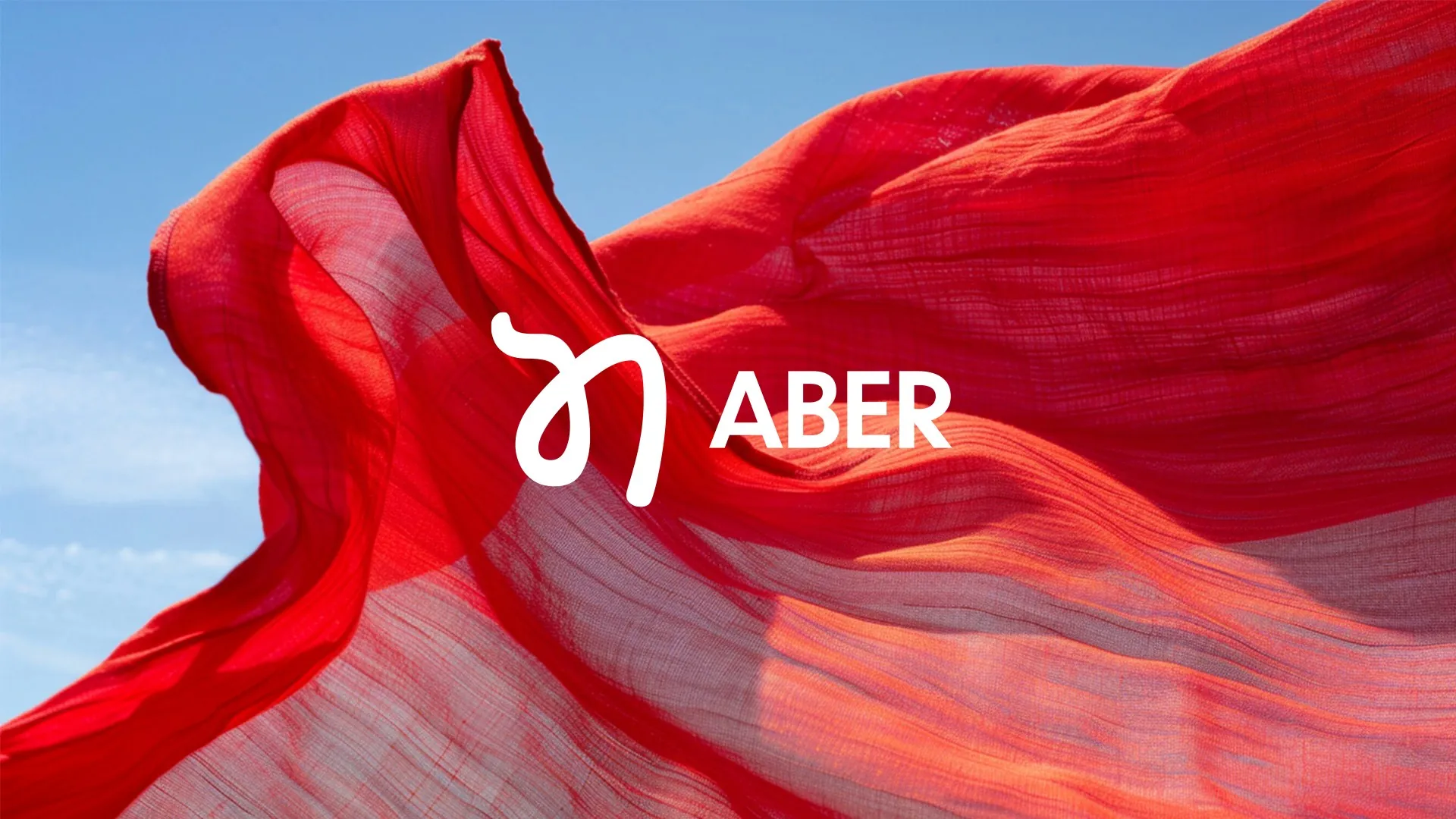 Le logo Aber en blanc sur un voile rouge